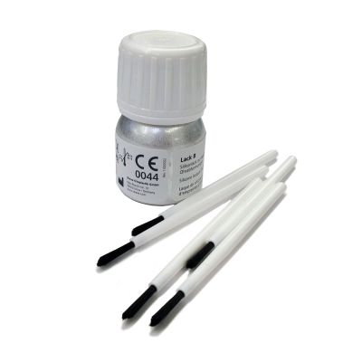 Dreve Lack B silicone lacquer shown in 50 ml aluminum bottle with five brushes.