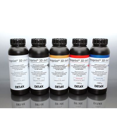Detax Luxaprint 3D shell resin showing the five colors in 1000 g bottles