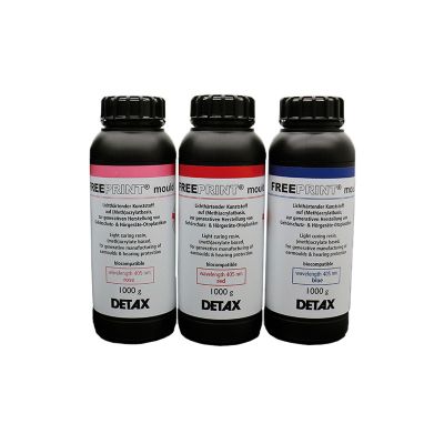 Detax Freeprint mould showing three available colors in 1000 g bottles