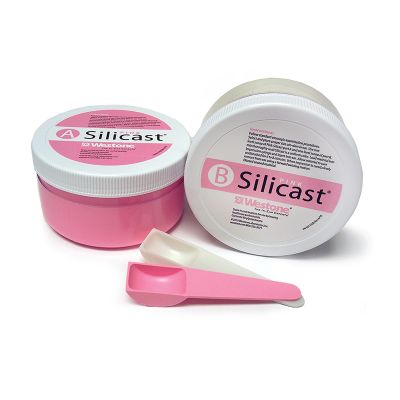 Westone Pink Silicast impression material in 335 g tubs with spoons.